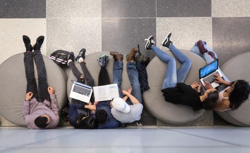 students with laptops